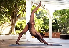 Sexy black milf engages in sensual naked yoga workout