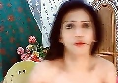 Shemale with a cute cock strokes her dick and ass