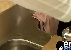 Cute gay guy wanks behind bar until he cums in a glass