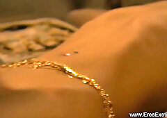 Glamorous Indian celebrity couple film themselves doing acrobatic lovemaking in their penthouse suite at sunset
