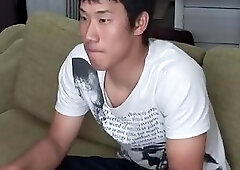 Japanese guy gets wanked and fingered