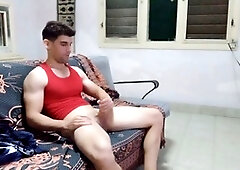 Scrambled1994 strokes his huge cock while his girlfriend is away