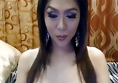 Classy shemale fingers her ass and jerks off on webcams