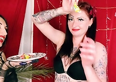 Naughty food fetish with two stunning ladies indulging in candy, passionate kisses, and drool