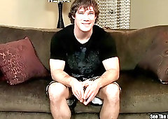 Buff guy works his stiff dick with his hand