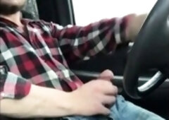 Stroking my big cock while driving