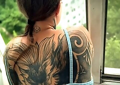 She was so seductive in the window that I had to spunk on her back from behind