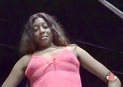 Hot girl in lingerie struts her stuff to the shop