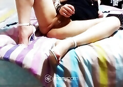 Well-endowed transgender beauty shows off her massive cock