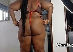 Sexy ebony Nigerian MILF Mara Exotic in lingerie doing laundry