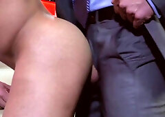 Man in a suit fucking a male stripper in the empty club