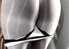 masturbating in shiny white hose and underware whilst looking in the mirror and getting cum.