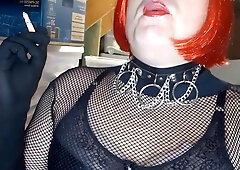 Ginger-Haired with crimson lips smoking