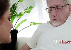 Mature milf Coralyn Jewel gives a deep blowjob to an older man in a living room