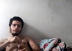 Laid in sofa stroking and smoking cigarrets alone.