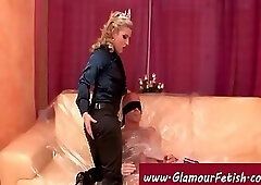 Clothed girl fucks plastic wrapped man