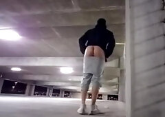 Plugged & Encaged Exhibitionist Boinks his Booty with Fuck Stick at Parking Garage.
