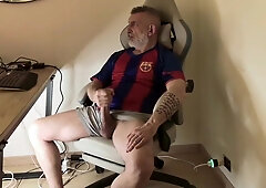 Mature parent with large wood frolicking at his desk