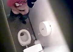 Cute gay masturbating in the toilet