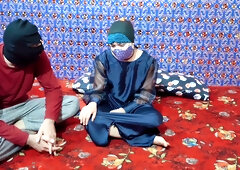 Masked South Asian couple shares intimate kiss and titjob on floral rug