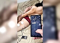 A masochistic trans gal is fastened up and given electric shocks.