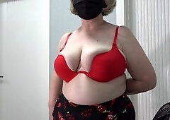 Hot MILF with giant natural boobs testing out a variety of bras as they bounce and jiggle