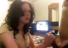 Attractive brunette crossdresser delivers a great blowjob