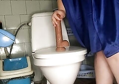 Curvy mother I'd like to fuck pissing and screwing her sex tool in the water closet