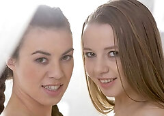 Gorgeous babes Olivia Grace and Tiffany Doll are fucking on the bed