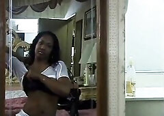 Youthful black with bouncy breasts groans during the time that getting drilled