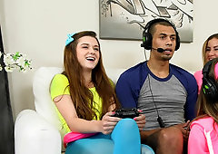 Three teen babes seduce a gamer and suck his huge dick