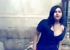 A beautiful Muslim girl dances sensually in a private Mujra performance. Her moves are graceful and seductive, showcasing her natural beauty and talen