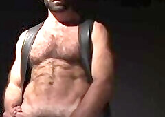 Hairy daddy Ray Dragon plays with his big throbbing cock solo