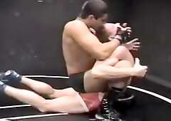 Guys wrestling Camel Clutch