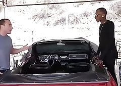 Two black guys have fun with this white dude