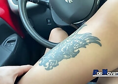 Victor Bloom receives a handjob and oral from a tattooed Brazilian companion in a red car