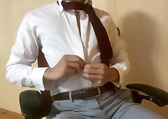 Asian boy drains while dressed in a suit (four)