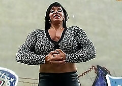 Female bodybuilder Jana posing on camera