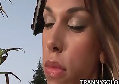 TS Carol Vendraminy stroking her hard cock