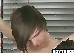 Two horny leashed hunks sucking on a hard cock