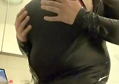 transgender in leather suit