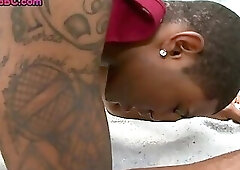 Tattooed black gay drilled in anal hole in doggystyle