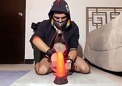 Guy with a dragon-themed fake cock gets filled up with toys