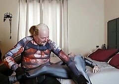 Sissy in spandex enjoys giving oral pleasure and getting anally penetrated