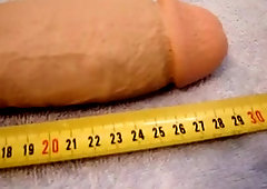 In leather with huge dildo