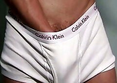 Jock works his own love muscle during his work out at the gym