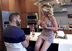 Stepson takes a shot from stepmom's boobies and fucks her cunt in the kitchen