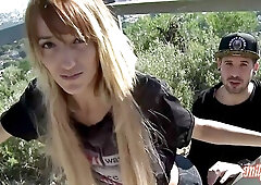 Isabelle is wearing only black shoes with high heels while having steamy sex in a public place