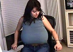 Busty curly brunette with big boobs fucks on couch