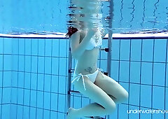 Roxalana Cheh sexy redhead underwater